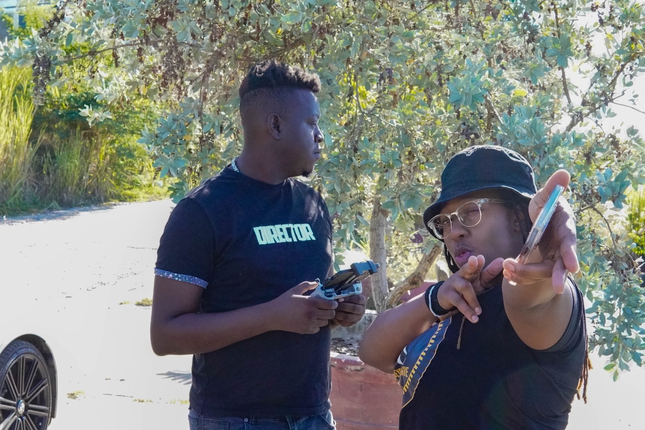 Promaxx directing with the production team on location