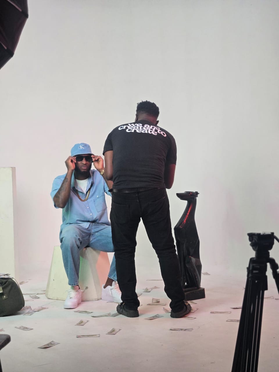 Promaxx directing an artist during a studio performance setup