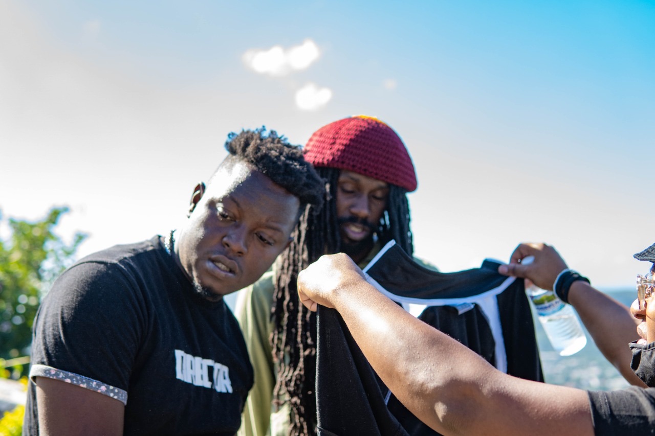 Promaxx and the artist reviewing wardrobe during production